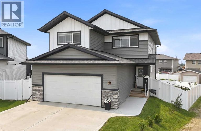 The attractive curb appeal is enhanced by permanent Gemstone exterior lighting