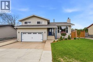The home offers excellent curb appeal, enhanced by attractive front landscaping