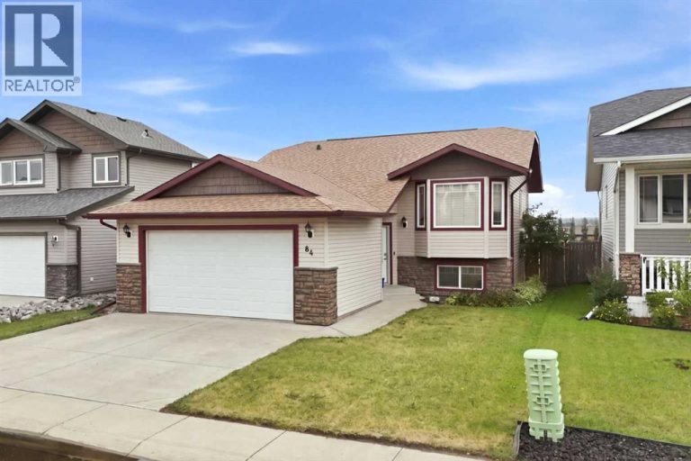 The shingles were replaced approximately four years ago, and the home features an attached heated double garage
