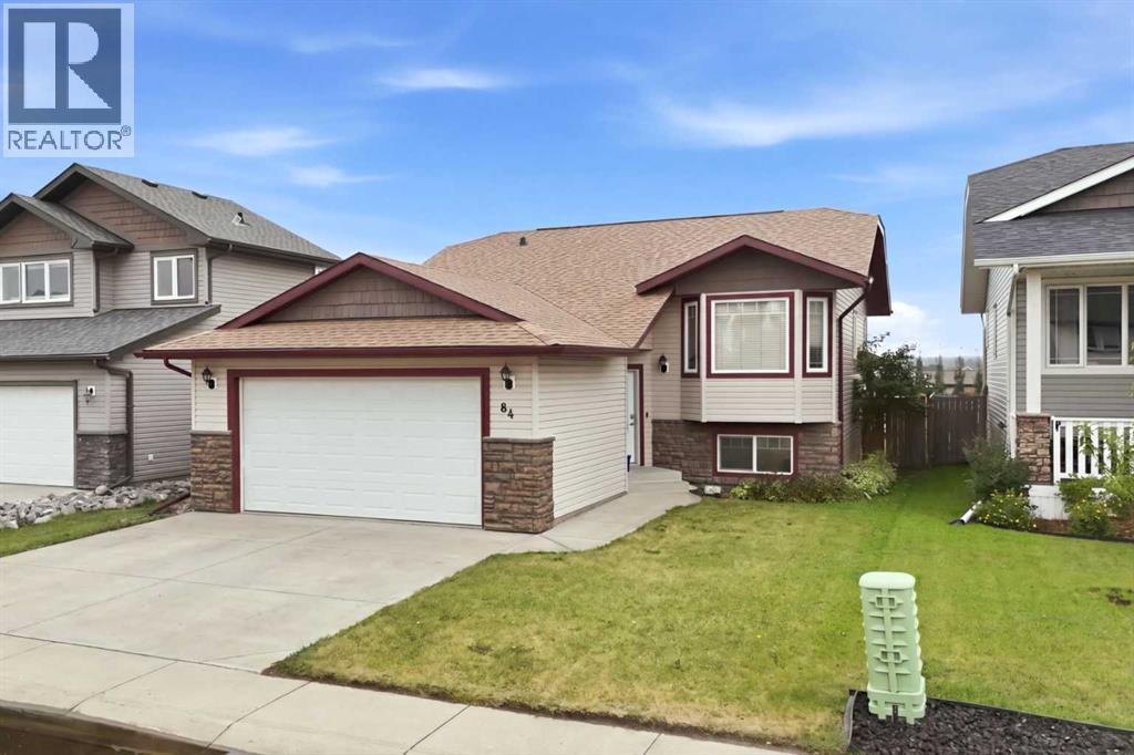 The shingles were replaced approximately four years ago, and the home features an attached heated double garage