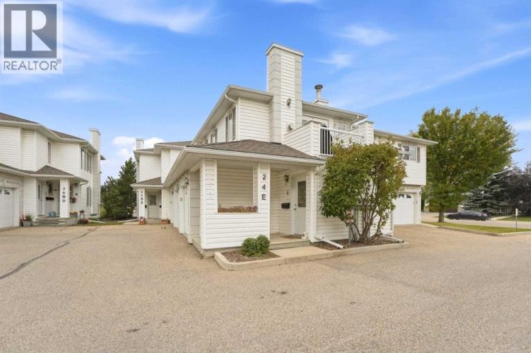 The home offers attractive curb appeal, highlighted by a covered front entrance concrete patio